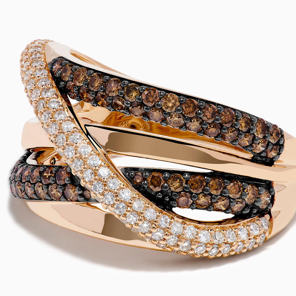 The 14K Rose Gold Brown and White Diamond Crossover Ring showcases interwoven bands accented with sparkling white diamonds and rich brown gemstones, creating a stunning layered and elegant look.