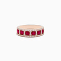 The Ruby Royale 14K Rose Gold Ruby and Diamond Band features five round rubies separated by vertical rows of diamonds, with extra diamonds lining the top and bottom edges for a dazzling effect.