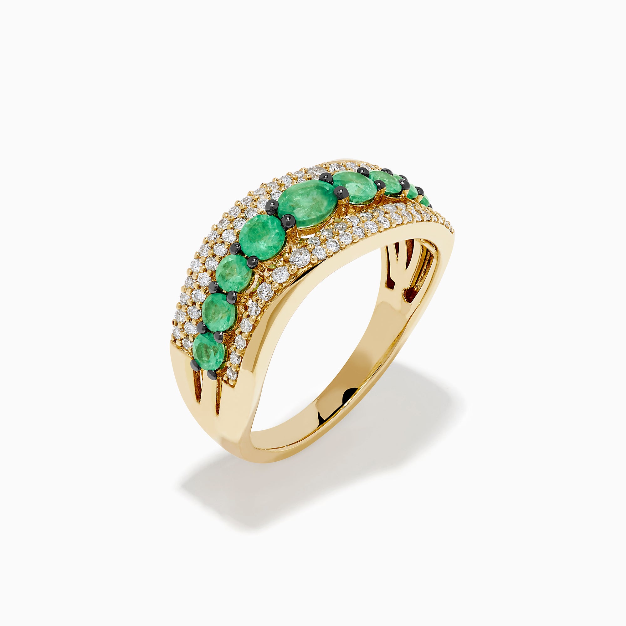 The 14K Yellow Gold Emerald and Diamond Wave Band features a central row of green emeralds bordered by two wavy rows of sparkling white diamonds in an elegant overlapping design.