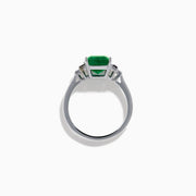 The 14K White Gold Emerald, Pink Sapphire, and Diamond Ring features a vibrant green emerald accented by pink sapphires and diamonds in modern geometric settings for an elegant look.