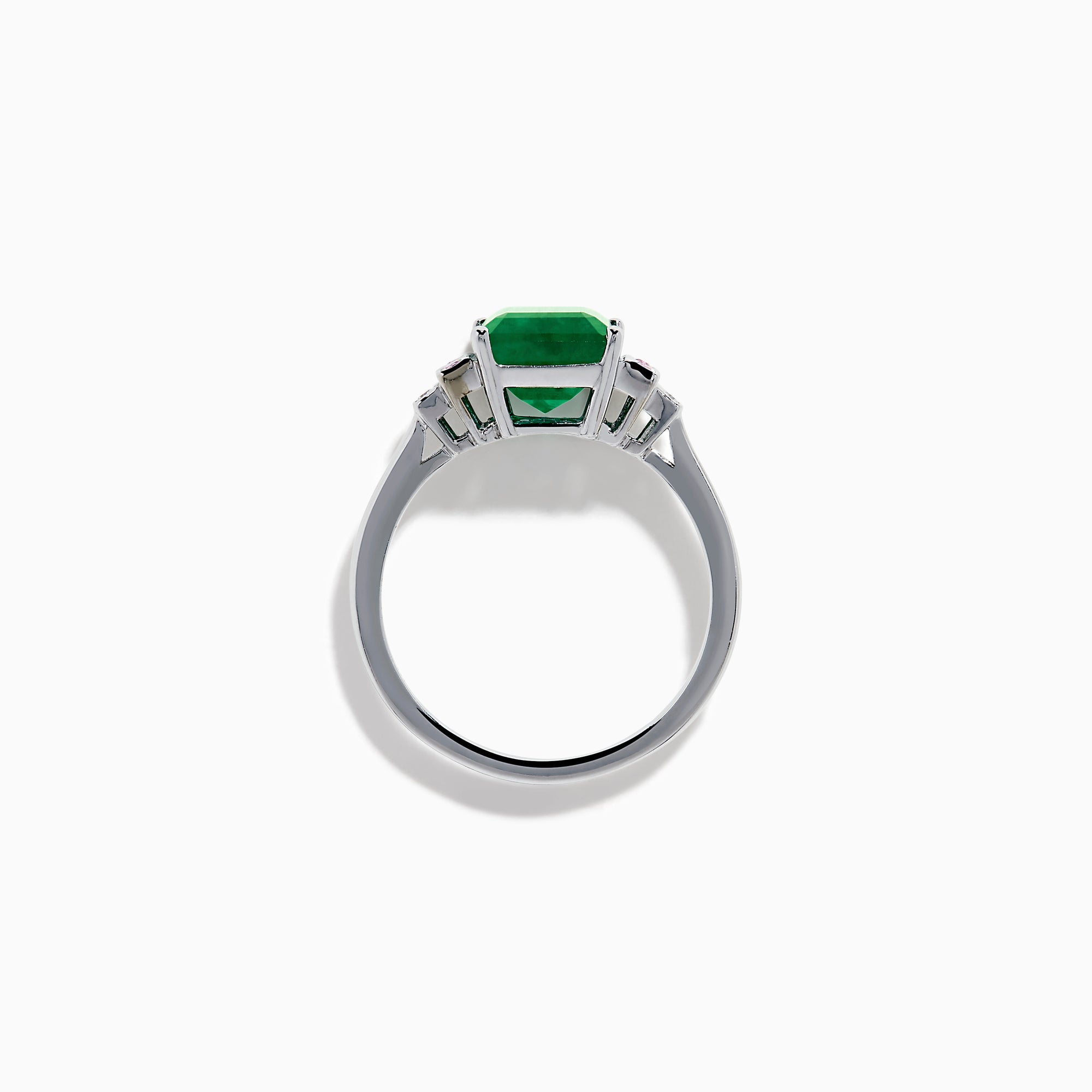 The 14K White Gold Emerald, Pink Sapphire, and Diamond Ring features a vibrant green emerald accented by pink sapphires and diamonds in modern geometric settings for an elegant look.