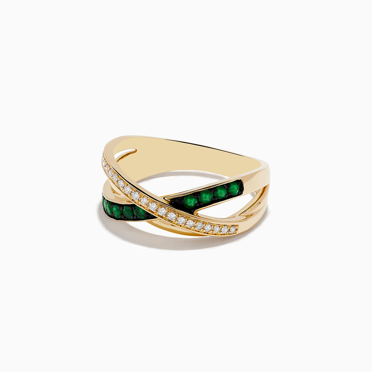The 14K Yellow Gold Emerald and Diamond Crossover Band features crisscrossing bands—one adorned with sparkling diamonds, the other with vivid emeralds—for an elegant, modern look.