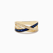The Royale Bleu 14K Yellow Gold Blue Sapphire and Diamond Crossover Ring features two overlapping bands: one set with diamonds, the other adorned with vivid blue sapphires.