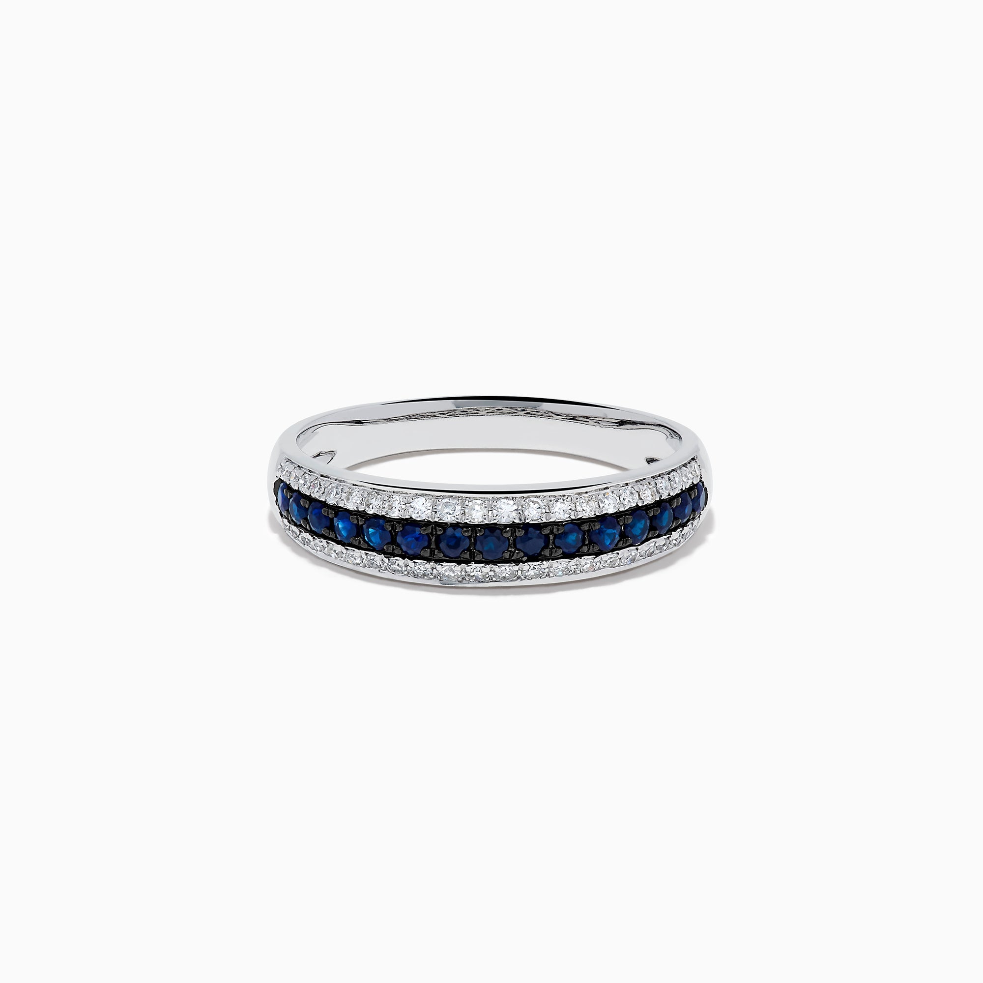 The 14K White Gold Pave Blue Sapphire and Diamond Band features a central row of blue sapphires bordered by sparkling diamonds, displayed on a plain white background.
