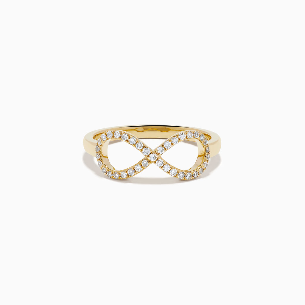 The 14K Yellow Gold Diamond Infinity Pinky Ring features an infinity symbol encrusted with small diamonds, creating a stunning statement piece against a plain white background.