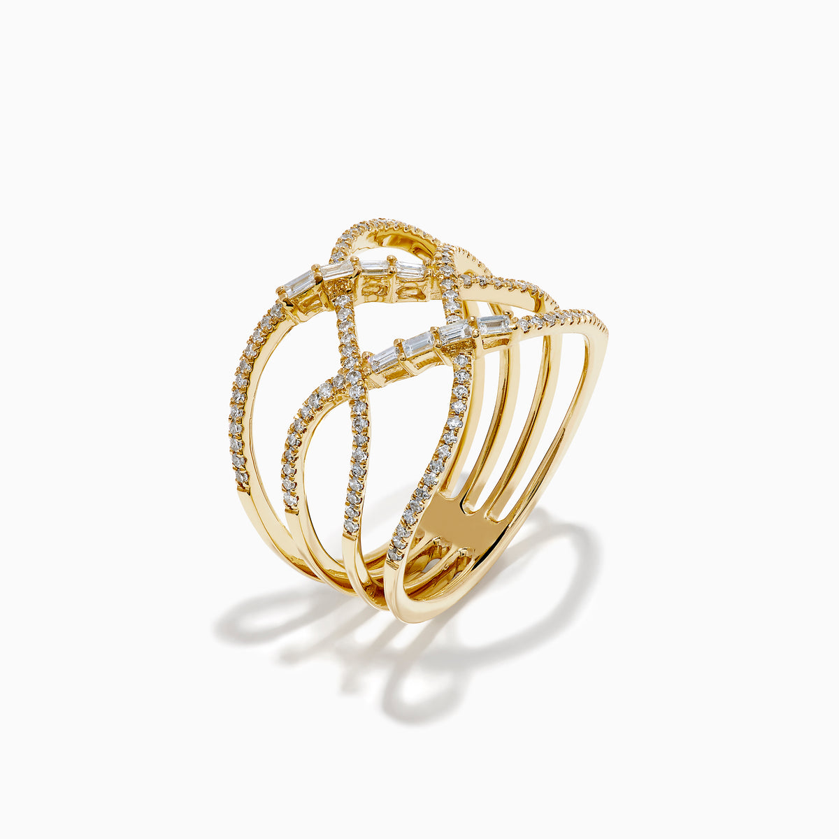 The D'Oro 14K Yellow Gold Interlaced Crisscross Diamond Ring features overlapping bands adorned with small diamonds and baguette-cut stones in a striking crisscross pattern, displayed on a white background.