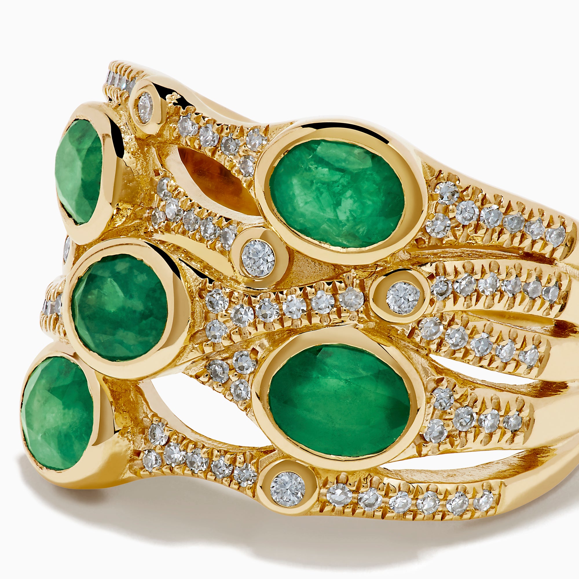 The 14K Yellow Gold Bezel Emerald and Diamond Multi Row Ring features five round green emeralds set in separate bands, accented with white diamonds and intricate detailing for a striking design.