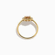 The 14K Yellow Gold Brown and White Diamond Halo Ring features a round brown and white diamond center, accented by a halo of sparkling small white diamonds.