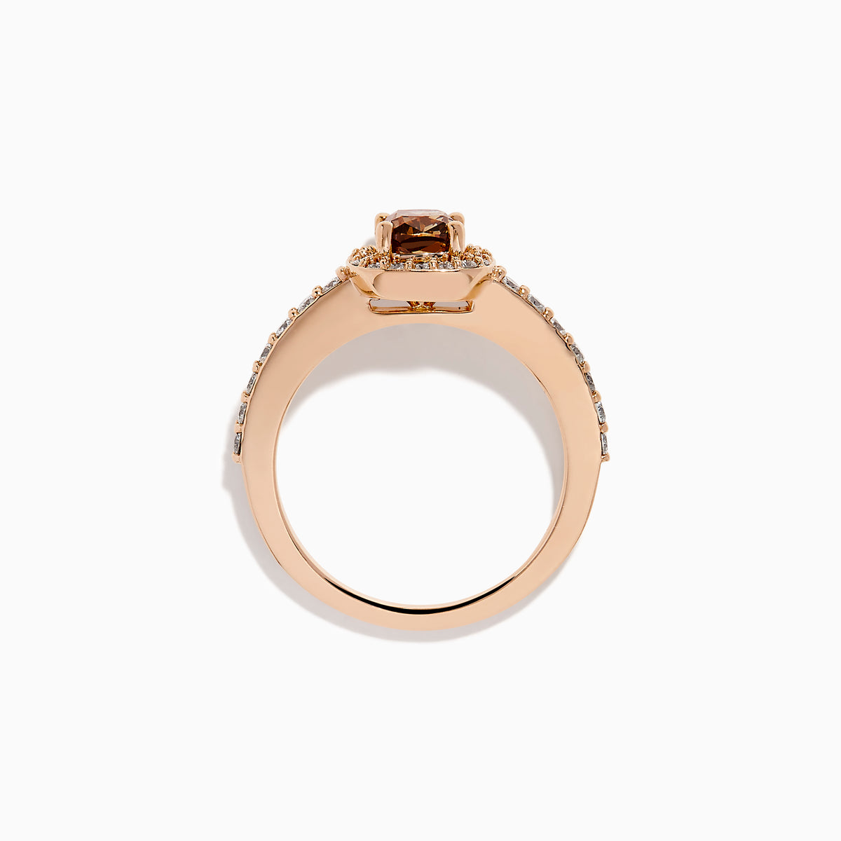 The Espresso 14K Rose Gold Brown and White Diamond Ring showcases a cushion-cut brown center stone, surrounded by a halo of white diamonds with extra diamonds adorning the band.