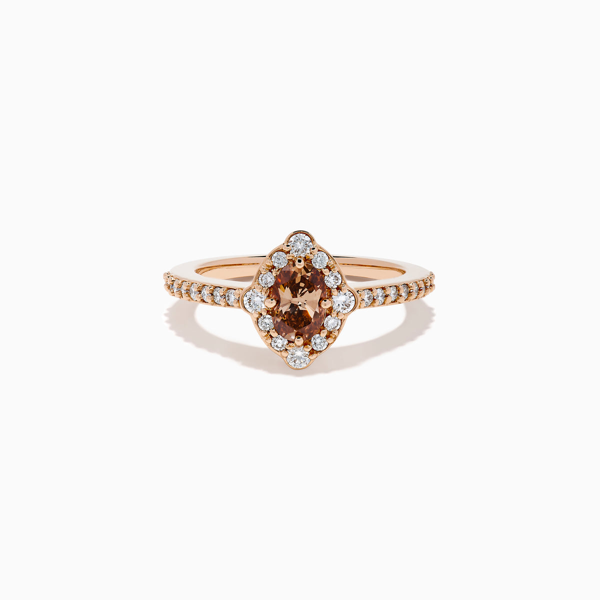 The 14K Rose Gold Brown and White Diamond Halo Ring showcases an oval brown and white diamond center, encircled by a halo of white diamonds and set with additional diamonds along the band.