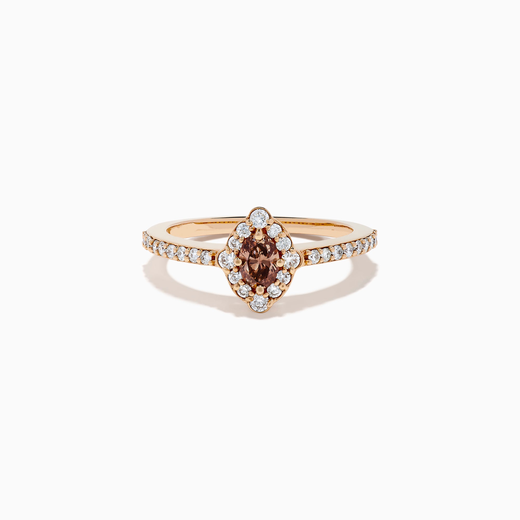 The 14K Rose Gold Brown and White Diamond Marquise Halo Ring features a marquise-cut brown and white diamond centerpiece, accented by round diamonds in a halo and along the band.