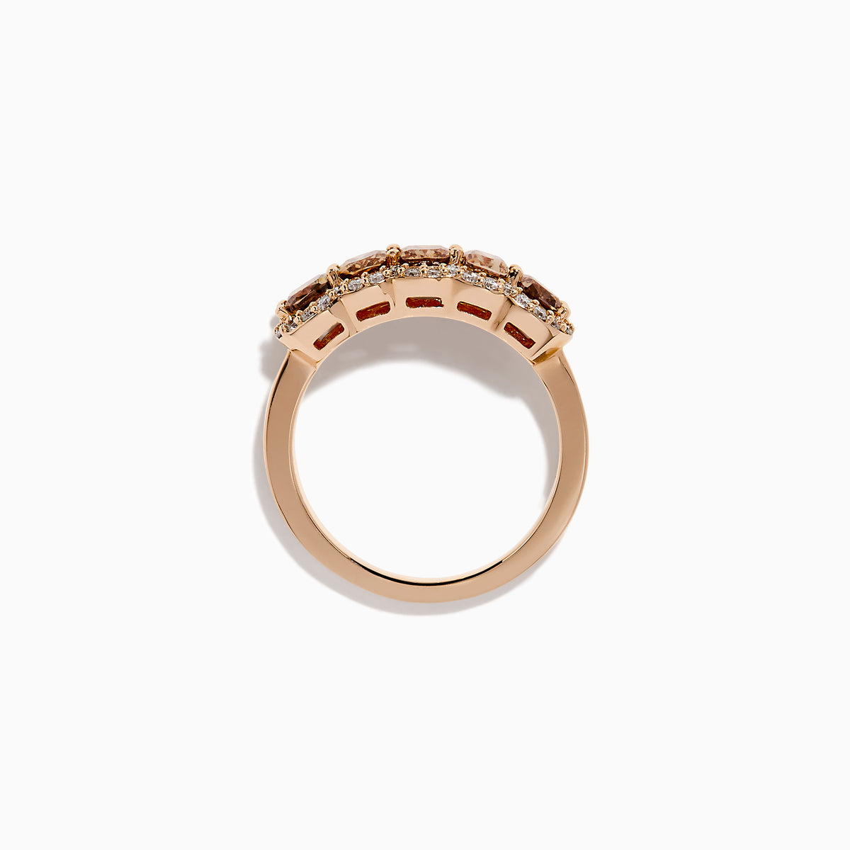 The 14K Rose Gold Cushion Cut 5 Stone Brown Diamond Band showcases five brown cushion-cut diamonds accented by round white diamonds, creating an elegant and sophisticated look.