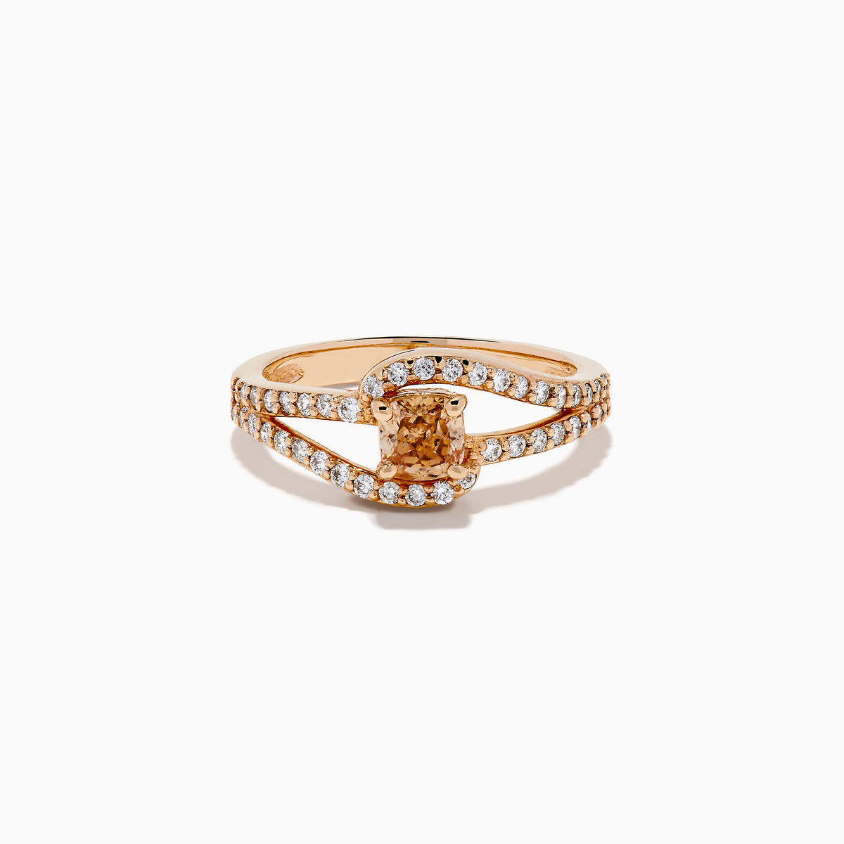 The 14K Rose Gold Brown and White Diamond Ring features a rectangular orange gemstone at the center, accented by two rows of sparkling white diamonds that gracefully curve and split around the vibrant stone.