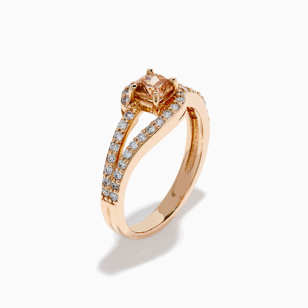 The 14K Rose Gold Brown and White Diamond Ring features a rectangular orange gemstone at the center, accented by two rows of sparkling white diamonds that gracefully curve and split around the vibrant stone.