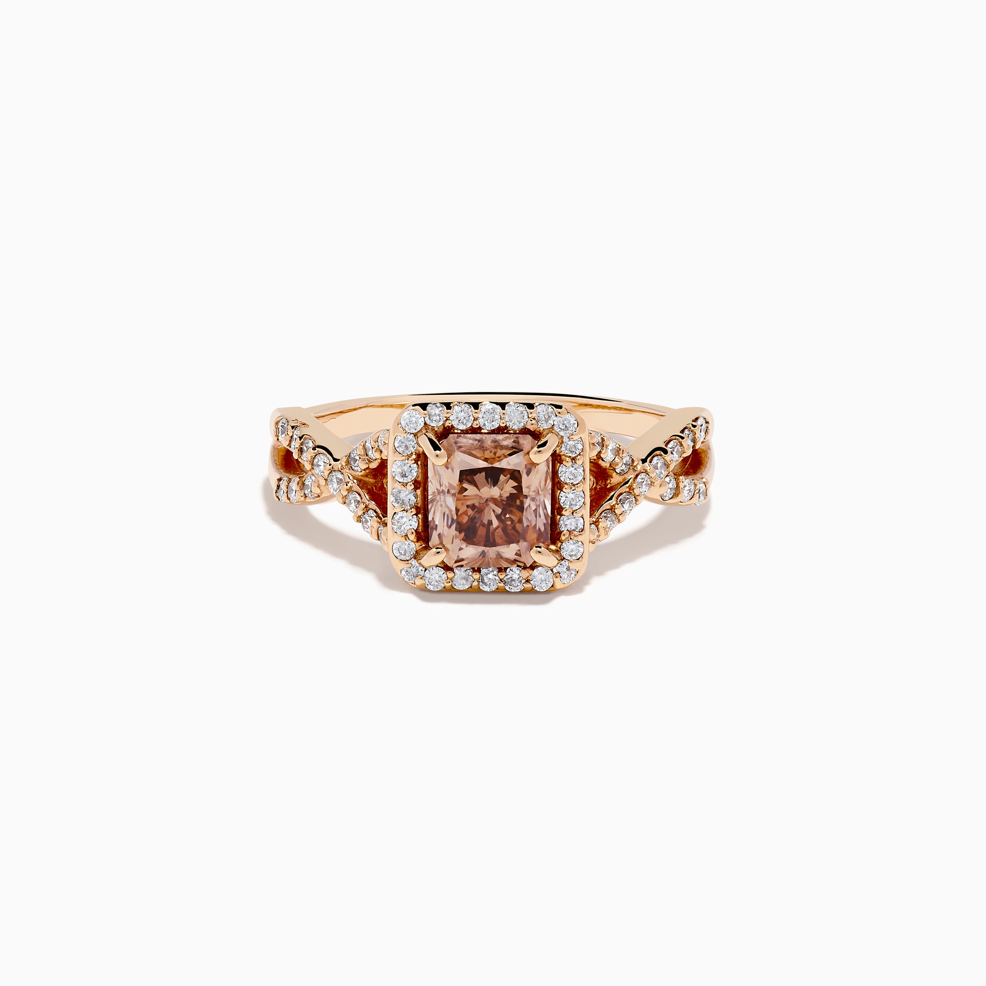 The Espresso 14K Rose Gold Brown Diamond Ring features a stunning brown diamond center with a halo of white diamonds and additional diamonds accenting its elegant twisted band.
