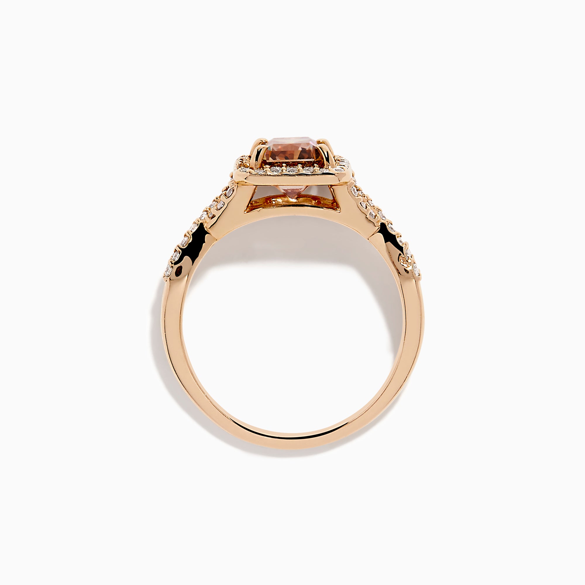 The Espresso 14K Rose Gold Brown Diamond Ring features a stunning brown diamond center with a halo of white diamonds and additional diamonds accenting its elegant twisted band.