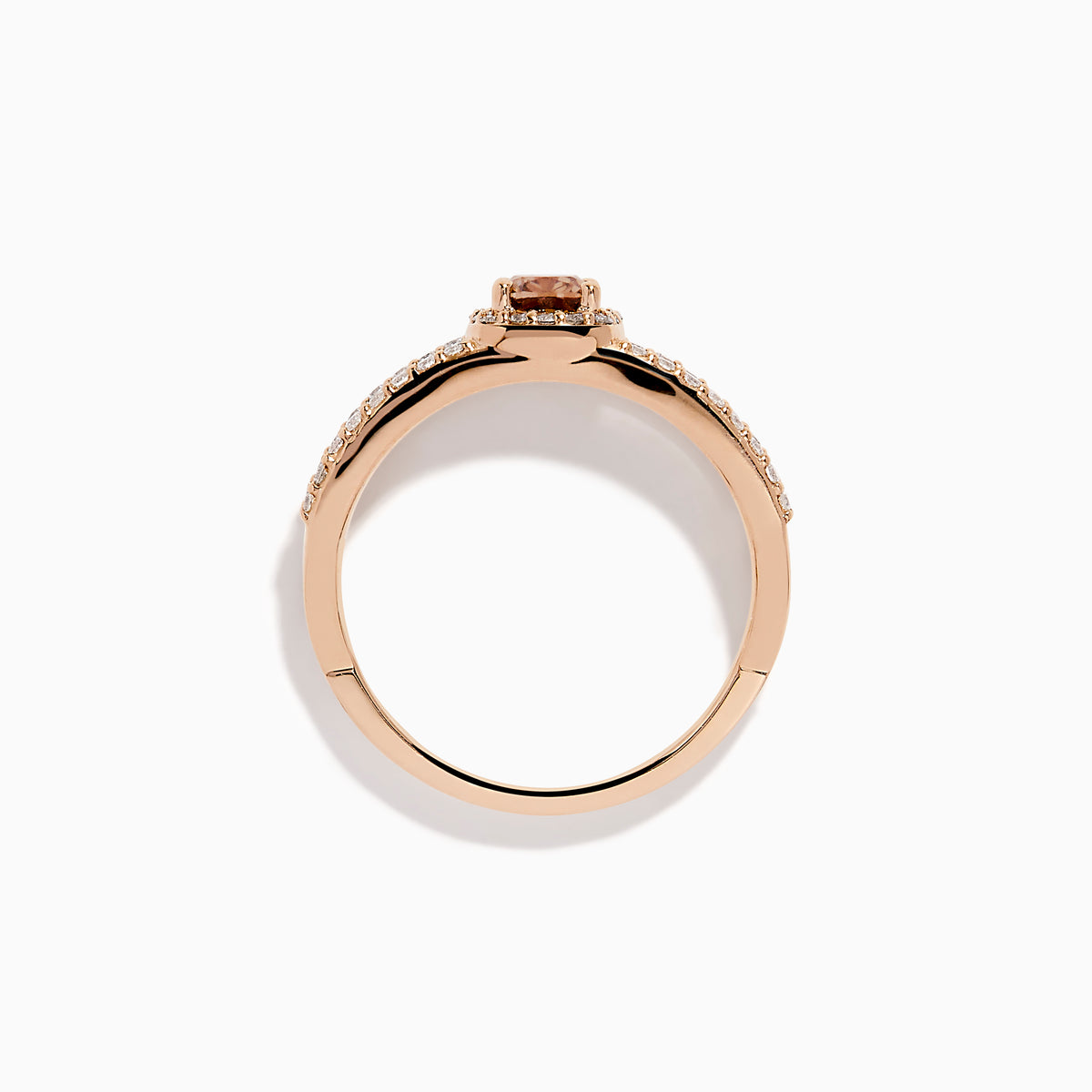 The Espresso 14K Rose Gold Brown Diamond Ring showcases a rectangular cushion-cut center stone, haloed by diamonds, and features a double band adorned with sparkling brown diamonds.