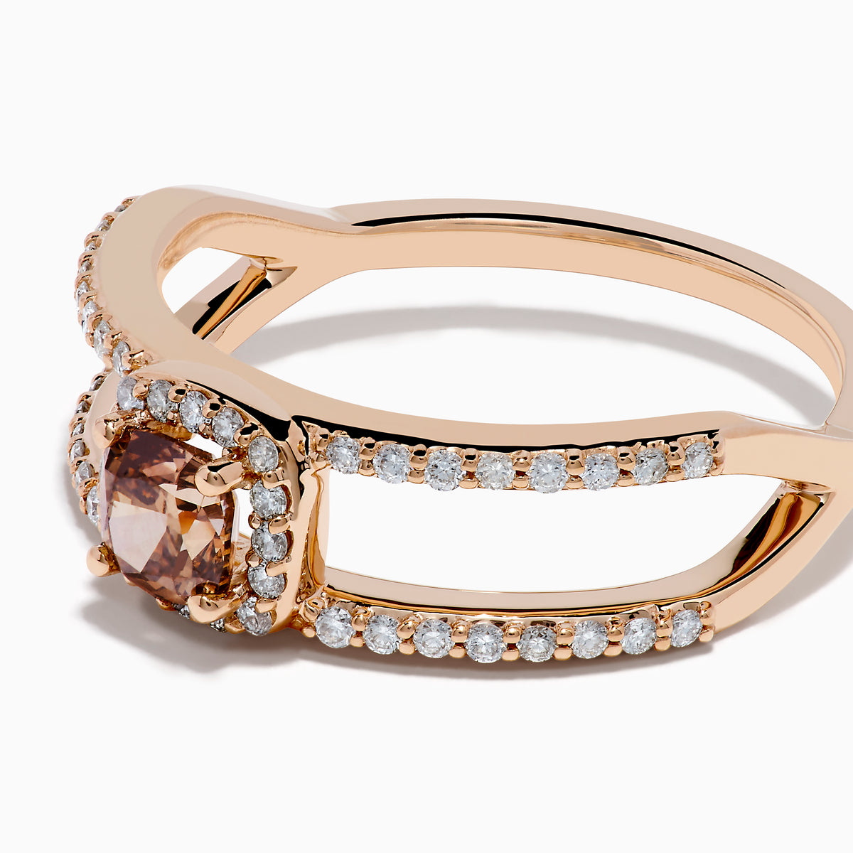 The Espresso 14K Rose Gold Brown Diamond Ring showcases a rectangular cushion-cut center stone, haloed by diamonds, and features a double band adorned with sparkling brown diamonds.