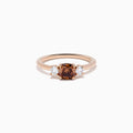 Espresso 14K Rose Gold Brown and White 3 Stone Diamond Ring featuring a rectangular brown center stone and two round white diamonds on each side, displayed against a plain white background.