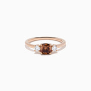 Espresso 14K Rose Gold Brown and White 3 Stone Diamond Ring featuring a rectangular brown center stone and two round white diamonds on each side, displayed against a plain white background.