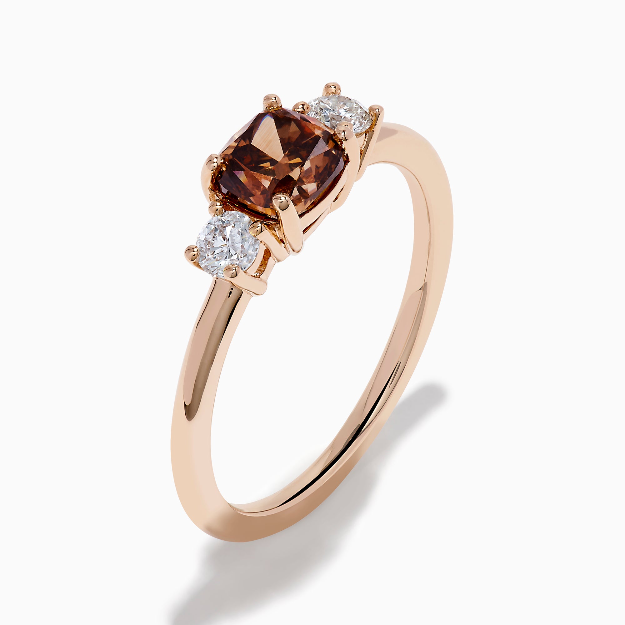 Espresso 14K Rose Gold Brown and White 3 Stone Diamond Ring featuring a rectangular brown center stone and two round white diamonds on each side, displayed against a plain white background.