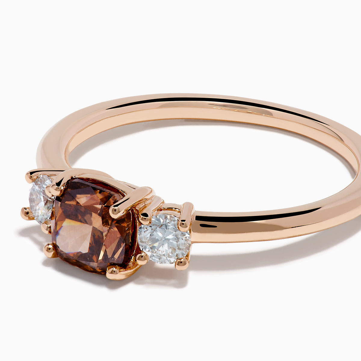 Espresso 14K Rose Gold Brown and White 3 Stone Diamond Ring featuring a rectangular brown center stone and two round white diamonds on each side, displayed against a plain white background.