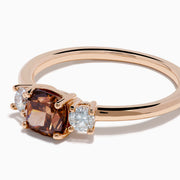 Espresso 14K Rose Gold Brown and White 3 Stone Diamond Ring featuring a rectangular brown center stone and two round white diamonds on each side, displayed against a plain white background.