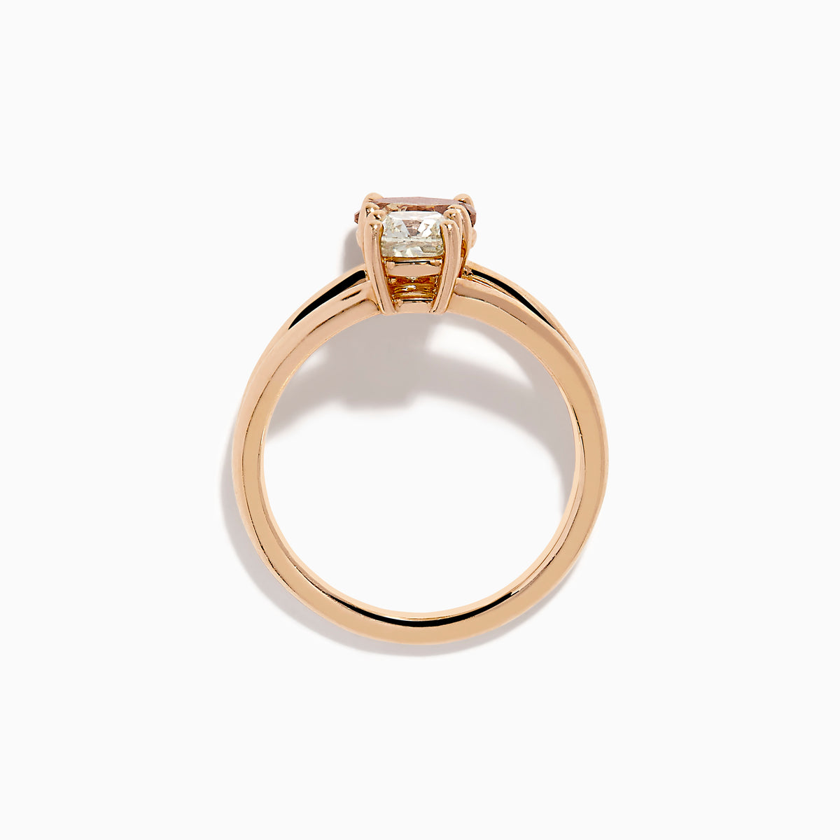 The Espresso 14K Rose Gold Brown and White Diamond Ring showcases two side-by-side stones—a round brown diamond and a white diamond—set on a split rose gold band, shown against a white background.