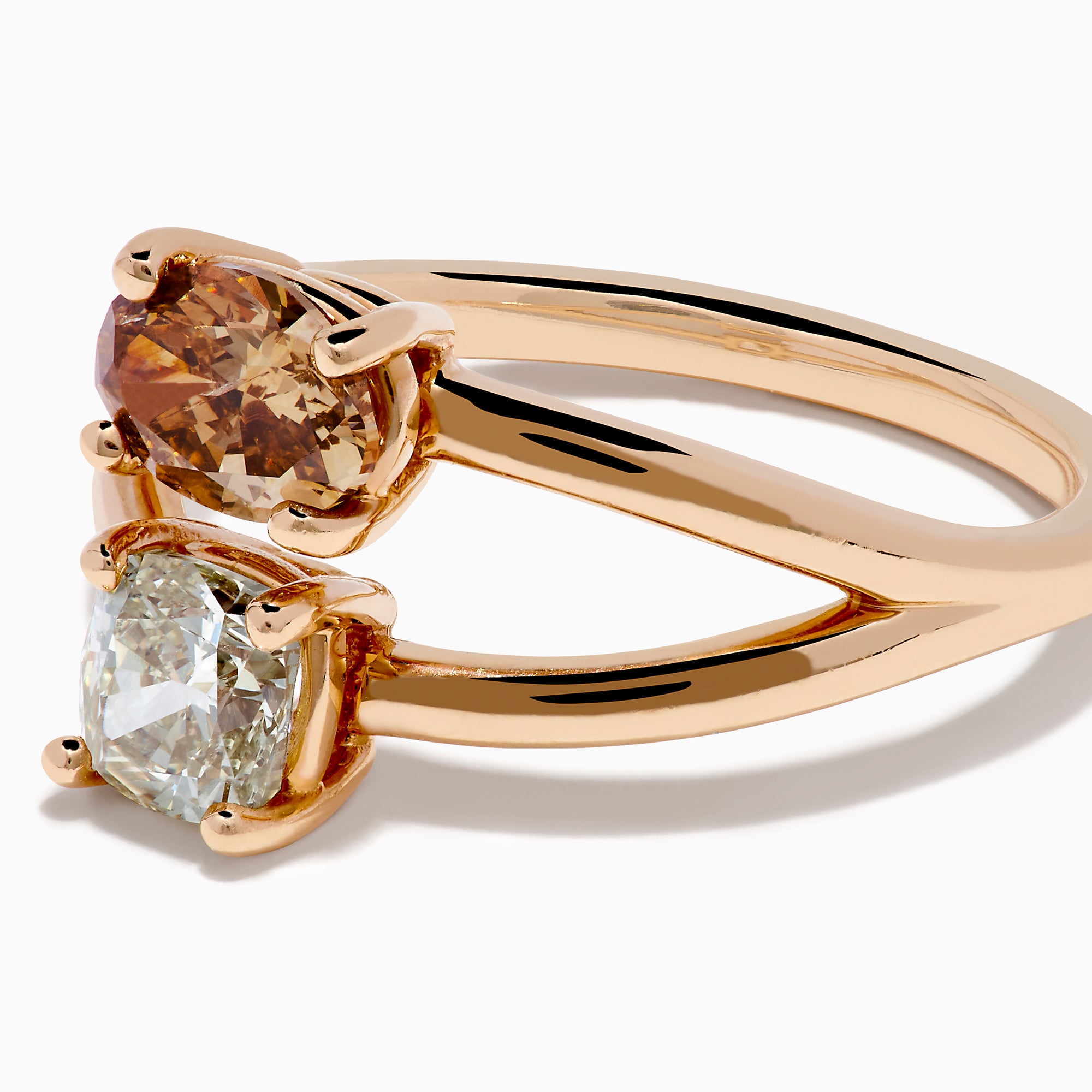 The Espresso 14K Rose Gold Brown and White Diamond Ring showcases two side-by-side stones—a round brown diamond and a white diamond—set on a split rose gold band, shown against a white background.