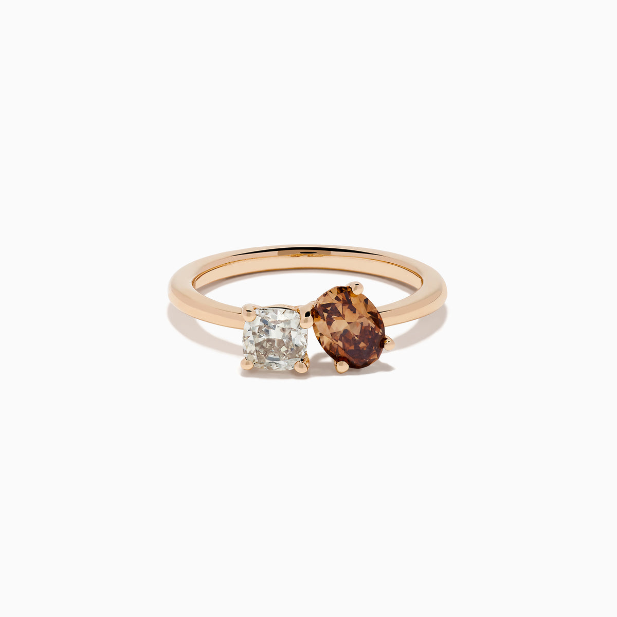 The 14K Rose Gold Brown and White Diamond Toi et Moi Ring features a square-cut white diamond and a round brown diamond set side by side in minimalist prongs on a slender band.
