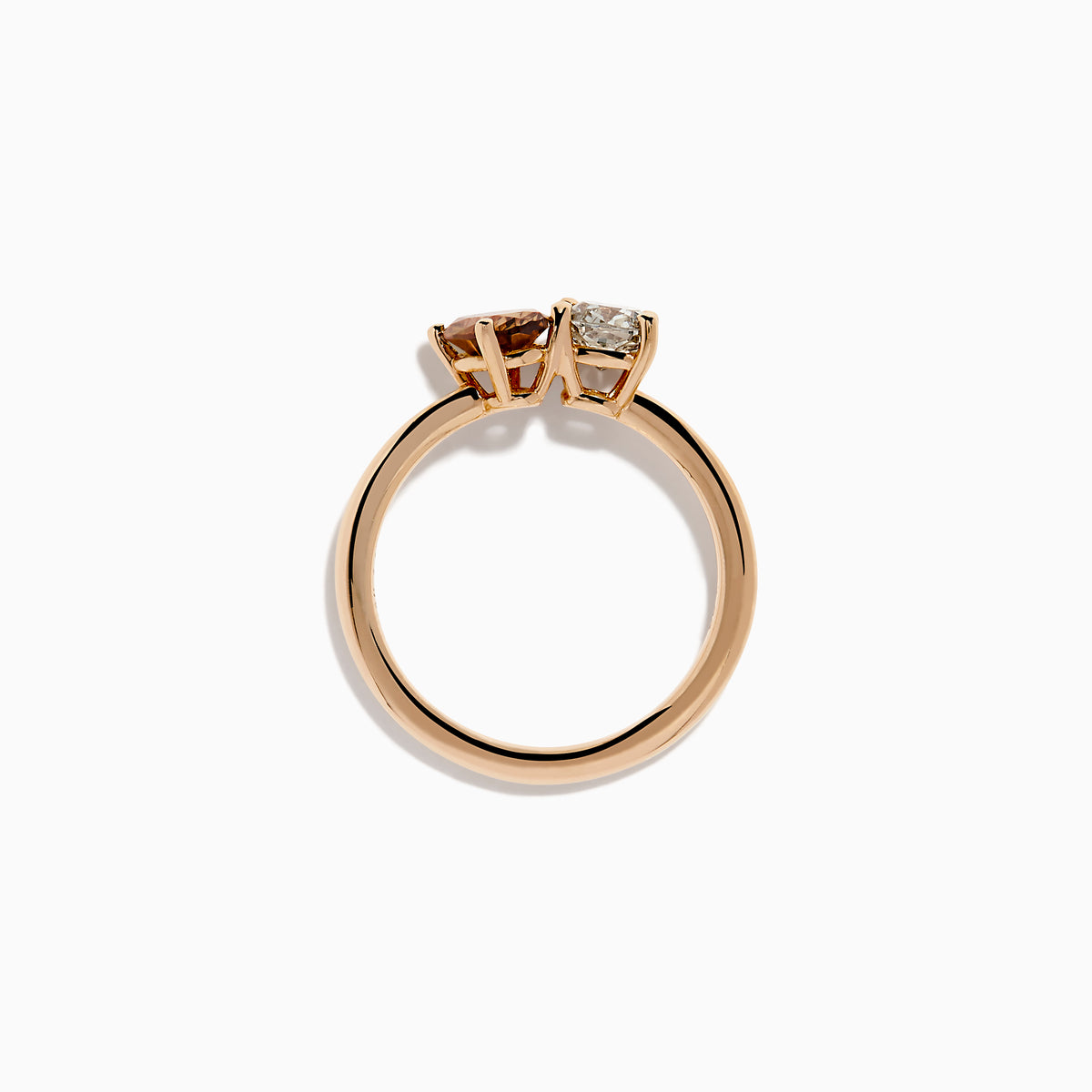 The 14K Rose Gold Brown and White Diamond Toi et Moi Ring features a square-cut white diamond and a round brown diamond set side by side in minimalist prongs on a slender band.