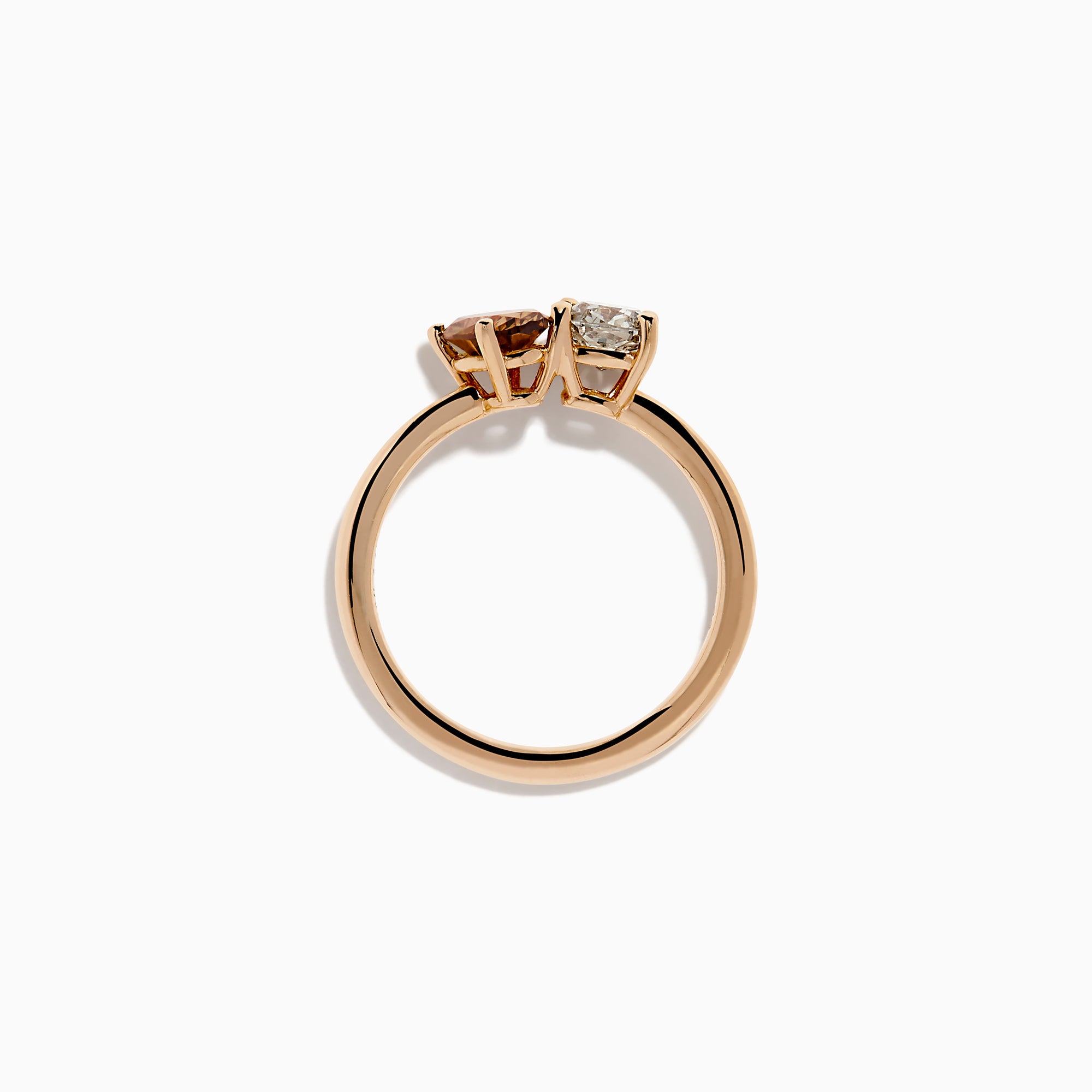 The 14K Rose Gold Brown and White Diamond Toi et Moi Ring features a square-cut white diamond and a round brown diamond set side by side in minimalist prongs on a slender band.