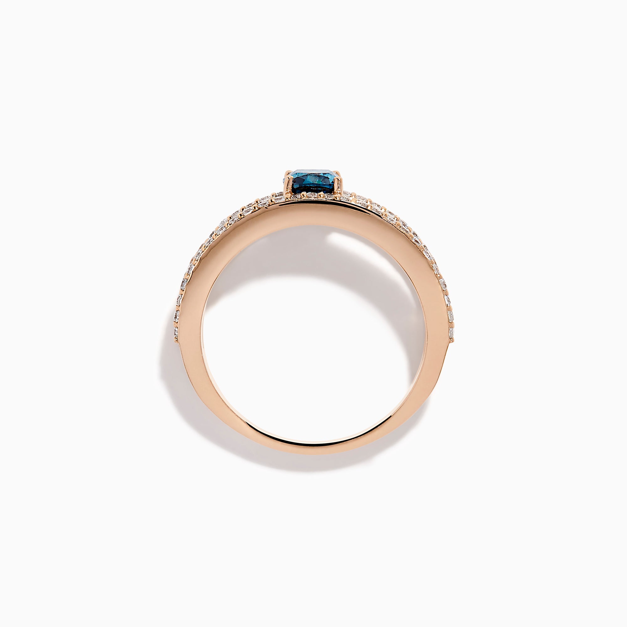 The Bella Bleu 14K Rose Gold Blue and White Diamond Ring features two parallel, diamond-encrusted bands and a cushion-cut blue gemstone centerpiece. This modern, elegant ring stands out beautifully against a crisp white background.