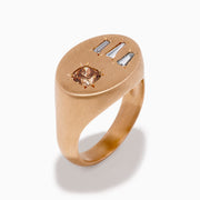 The Espresso 14K Rose Gold Brown and White Diamond Signet Ring showcases a round brown and white diamond on the left and three vertical rectangular white gemstones on the right of its flat top.
