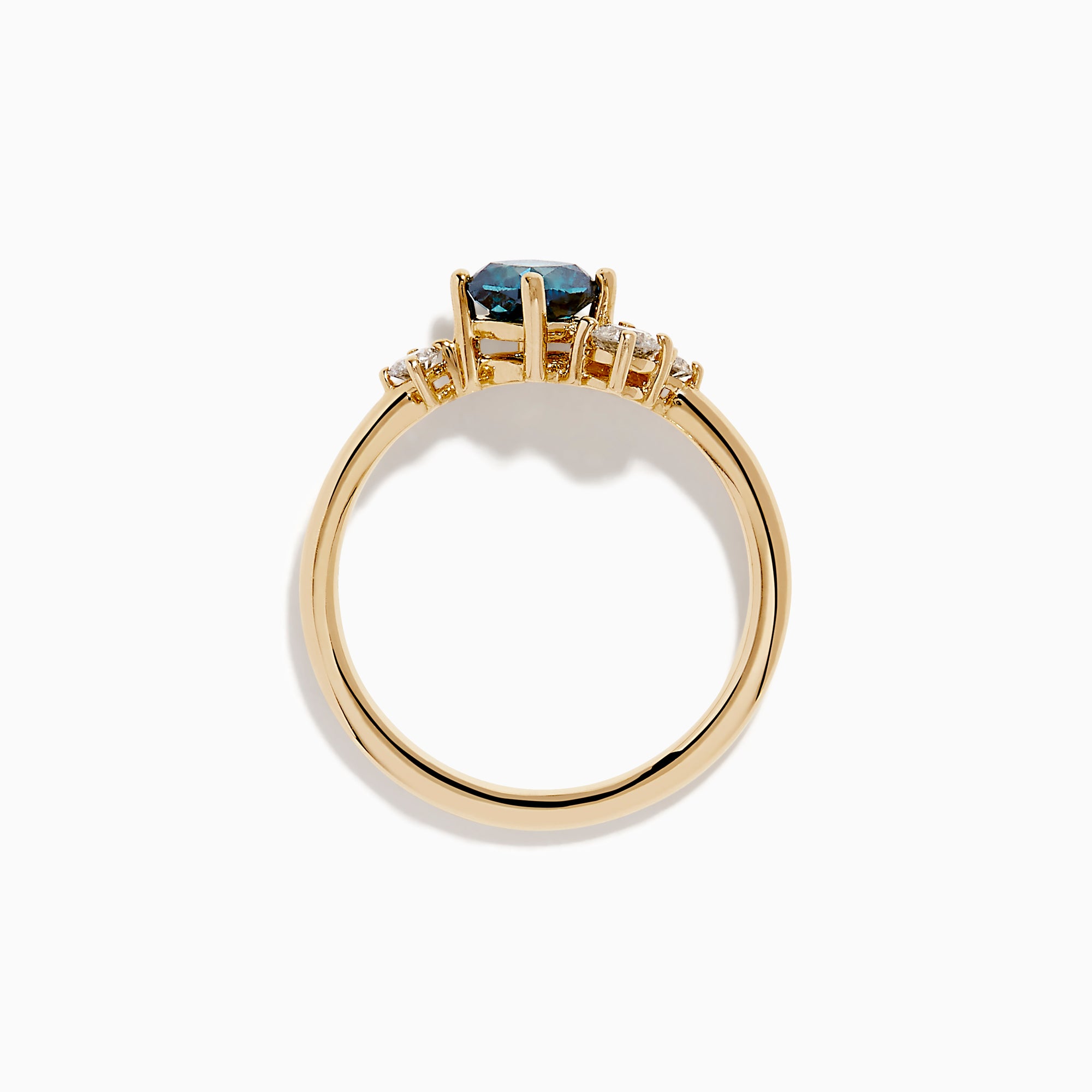The 14K Yellow Gold Blue and White Diamond Ring showcases a cushion-cut blue stone center with two round white diamonds on each side, set against a white background.