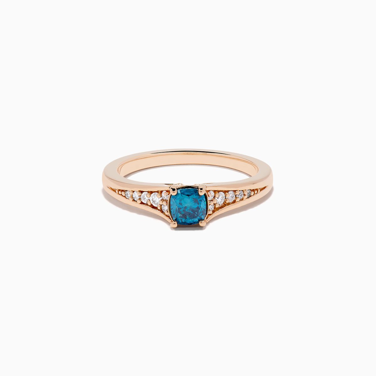 The Bella Bleu 14K Rose Gold Blue and White Diamond Ring showcases a blue rectangular gemstone at the center with small round white diamonds on each side, set against a plain white background.