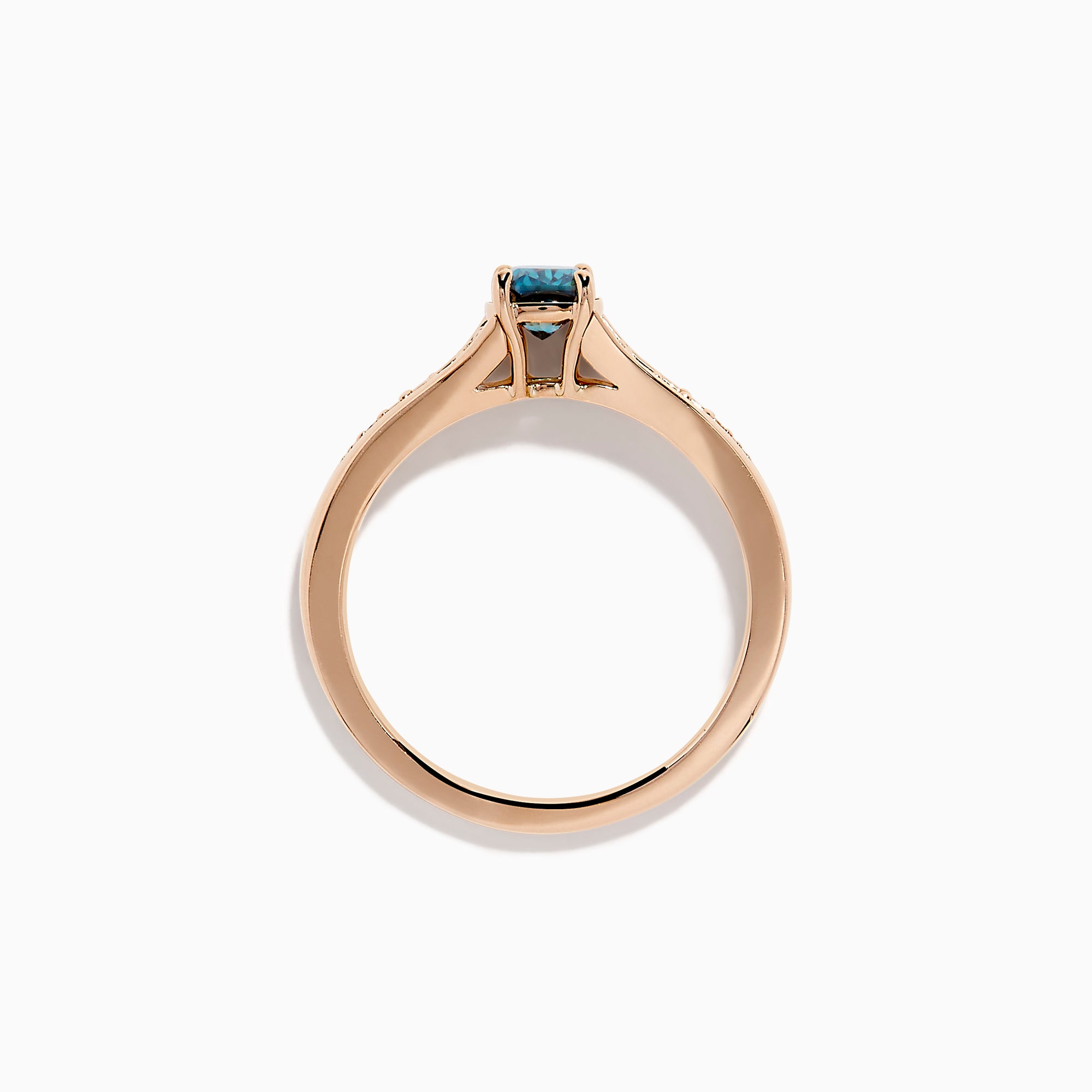 The Bella Bleu 14K Rose Gold Blue and White Diamond Ring showcases a blue rectangular gemstone at the center with small round white diamonds on each side, set against a plain white background.
