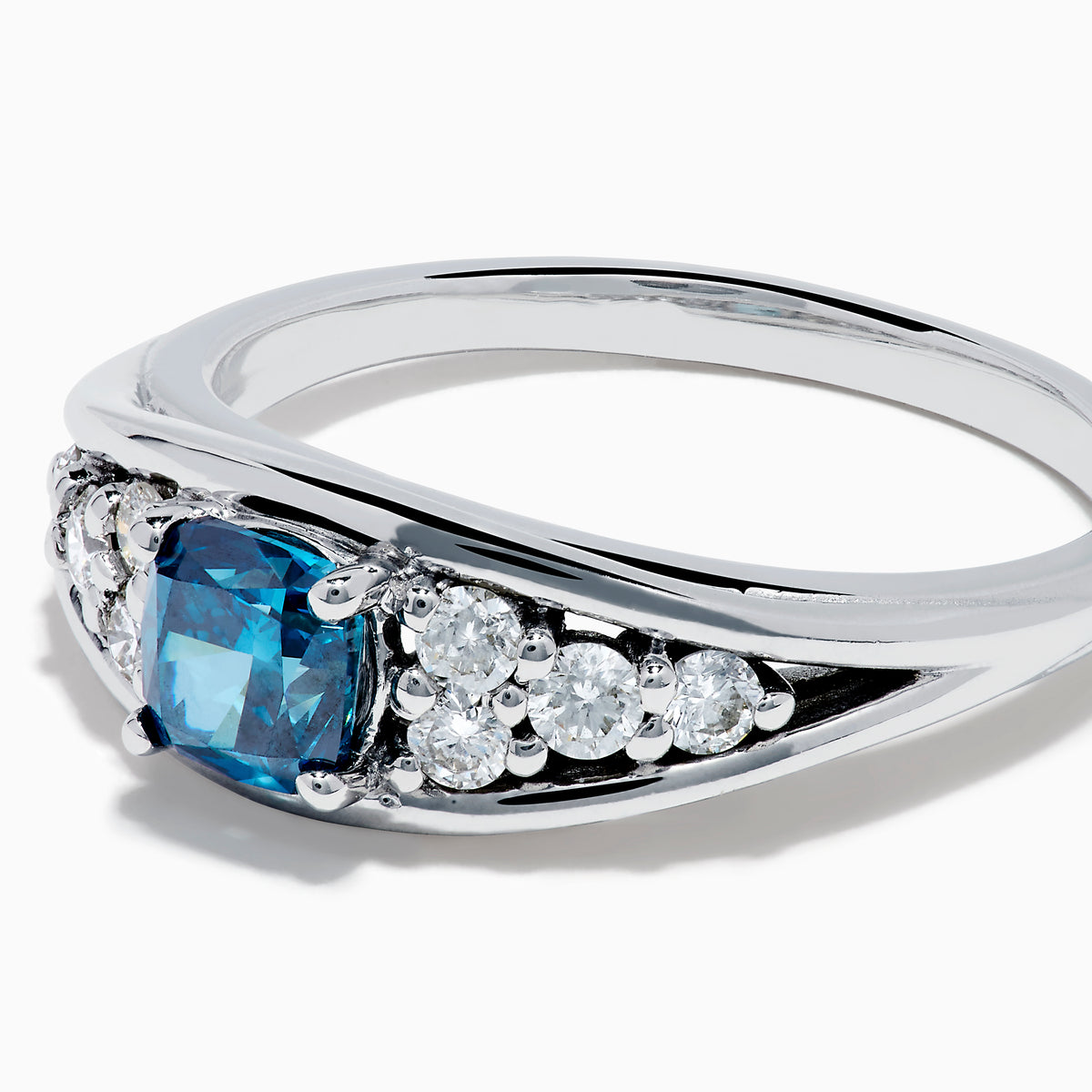 The Bella Bleu 14K White Gold Blue and White Diamond Ring showcases a vibrant square-cut blue center stone, accented by rows of round white diamonds on each side, displayed on a white background.