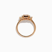 A close-up of the 14K Rose Gold Brown and White Diamond 3 Stone Ring, showcasing its beautiful brown and white diamonds in an elegant setting.
