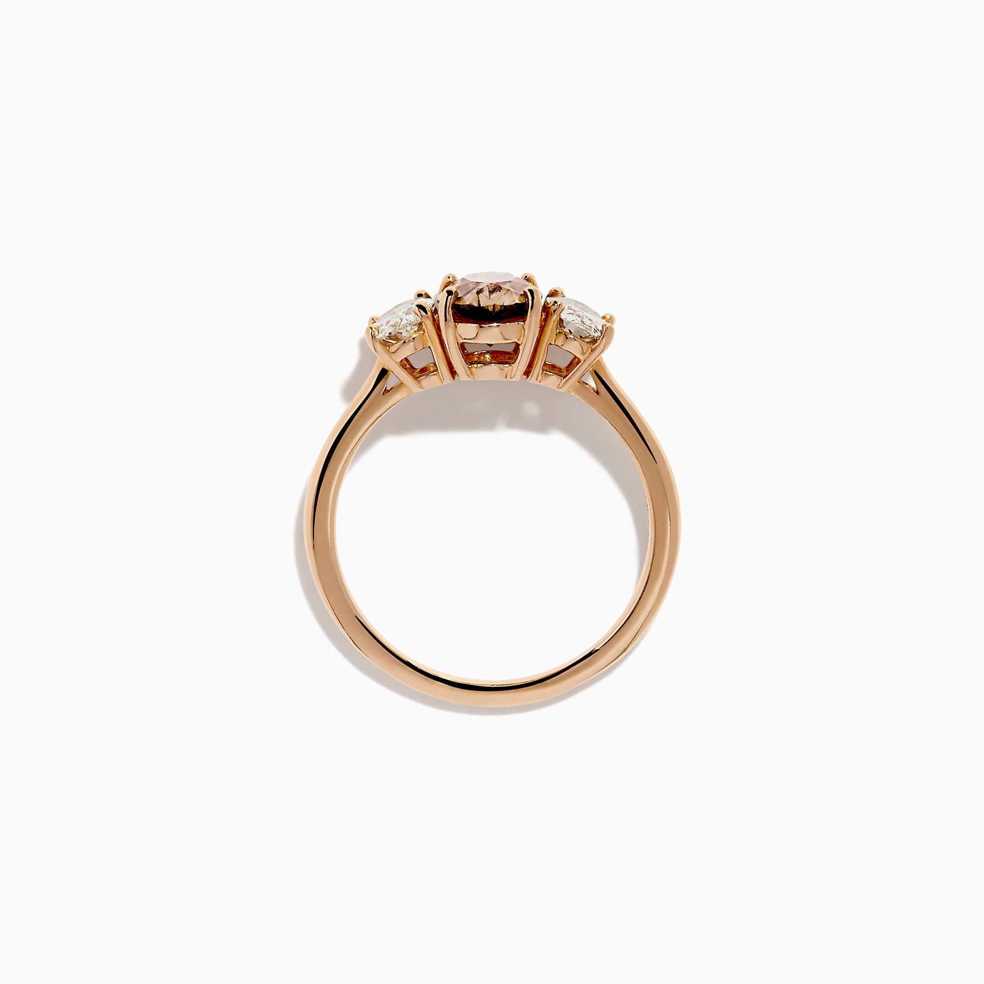 A close-up of the 14K Rose Gold Brown and White Diamond 3 Stone Ring, showcasing its beautiful brown and white diamonds in an elegant setting.