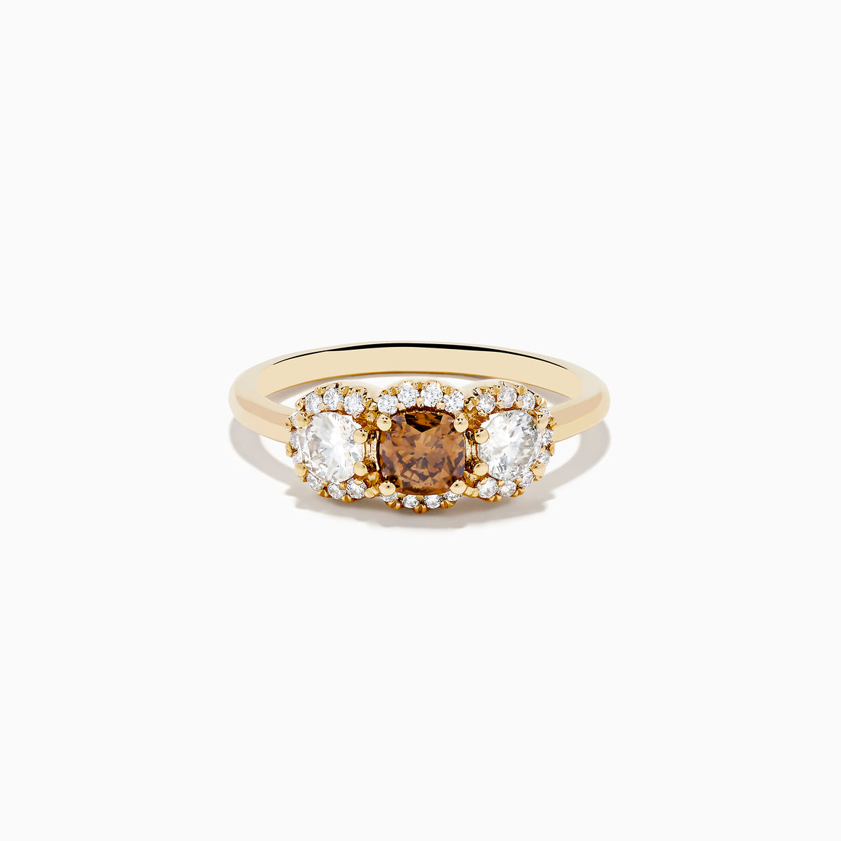The Espresso 14K Yellow Gold Brown Diamond 3-Stone Ring features a central brown diamond, two oval white stones, and sparkling halo accents for a stunning look.