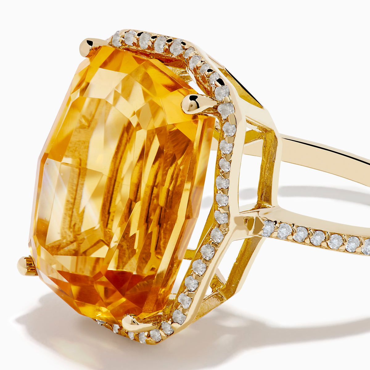 The Sunset 14K Yellow Gold Citrine & Diamond Ring features a large rectangular citrine surrounded by a halo of sparkling white diamonds, set against a white background.