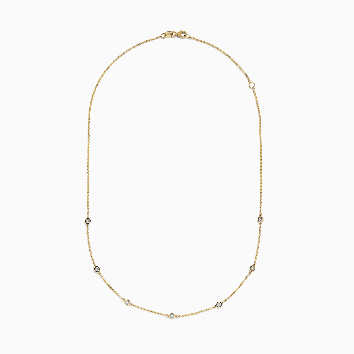 The DOro 14K Gold Diamond Station Necklace and Bracelet Set (0.59 TCW) features evenly spaced round diamonds on delicate chains, beautifully displayed on a white background.