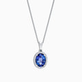 A 14K white gold pendant with an oval tanzanite (1.86 TCW) surrounded by diamonds, shown on a plain white background.