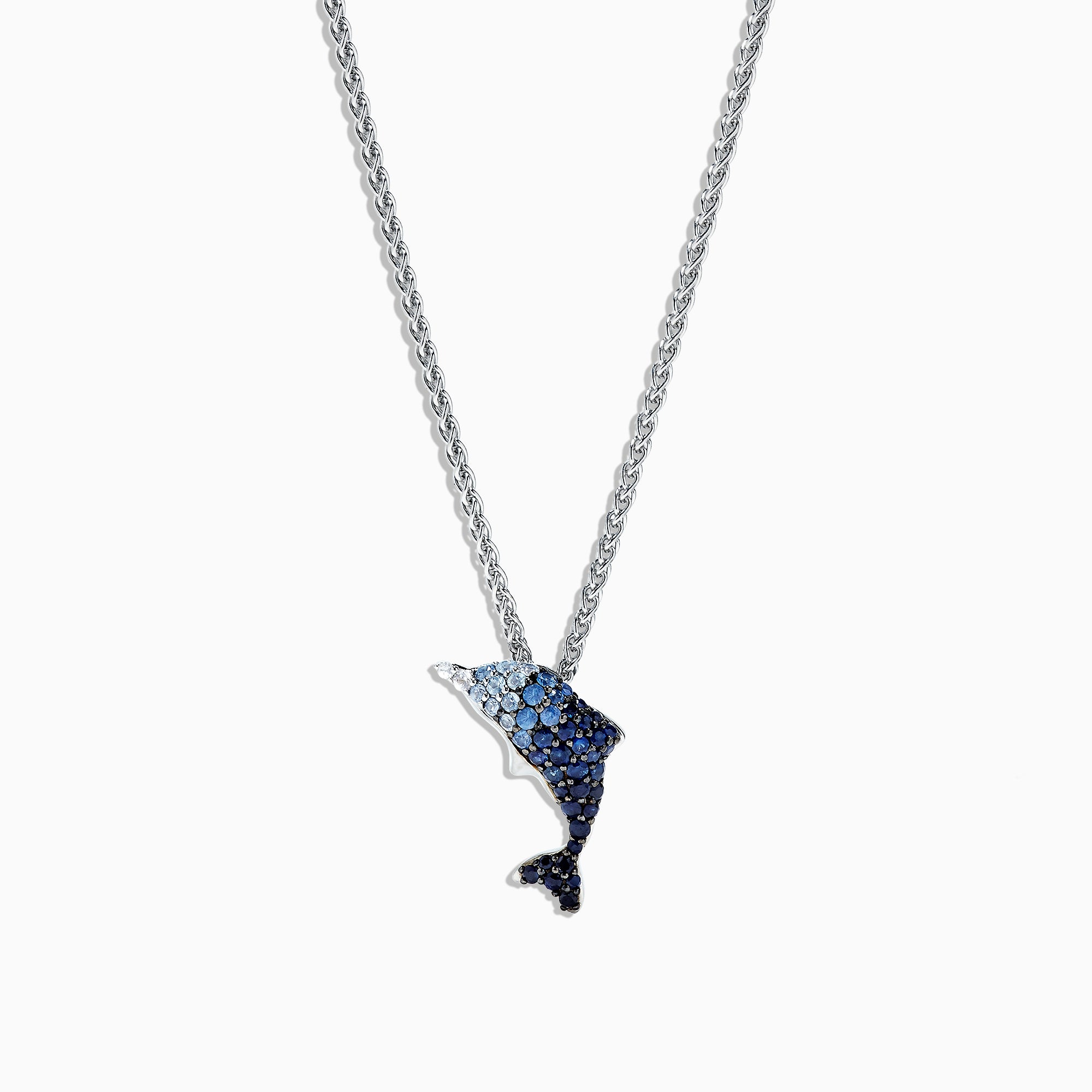 The 925 Sterling Silver Sapphire Splash Dolphin Pendant (1.30 TCW) necklace features a dolphin pendant with sapphire-blue gemstones, shown on a white background.