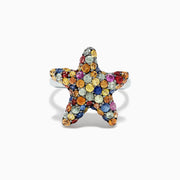The 925 Sterling Silver Multi Sapphire Splash Starfish Ring, 2.90 TCW, features a starfish design set with vibrant blue, yellow, orange, pink, and clear sapphires—an Effy piece that dazzles against a white backdrop.