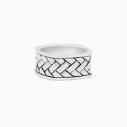 The Mens 925 Sterling Silver Ring features a wide band with a raised, braided center pattern and smooth edges—an elegant addition to any jewelry collection.