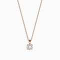 The Bouquet 14K Rose Gold Diamond Cluster Pendant (0.47 TCW) features a floral-inspired design with round white diamonds, showcased on a delicate gold chain against a white background.