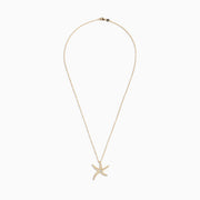 The DOro 14K Yellow Gold Diamond Starfish Pendant (0.51 TCW) hangs from a delicate chain and is shown sparkling against a plain white background.