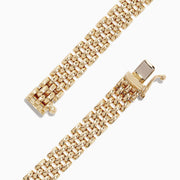 The Signature 14K 2-Tone Gold Diamond and Emerald 7 Bracelet (1.35 TCW) features two panther head designs with green eyes and black spots, each facing the other and holding a circular ring in their mouths against a white background.
